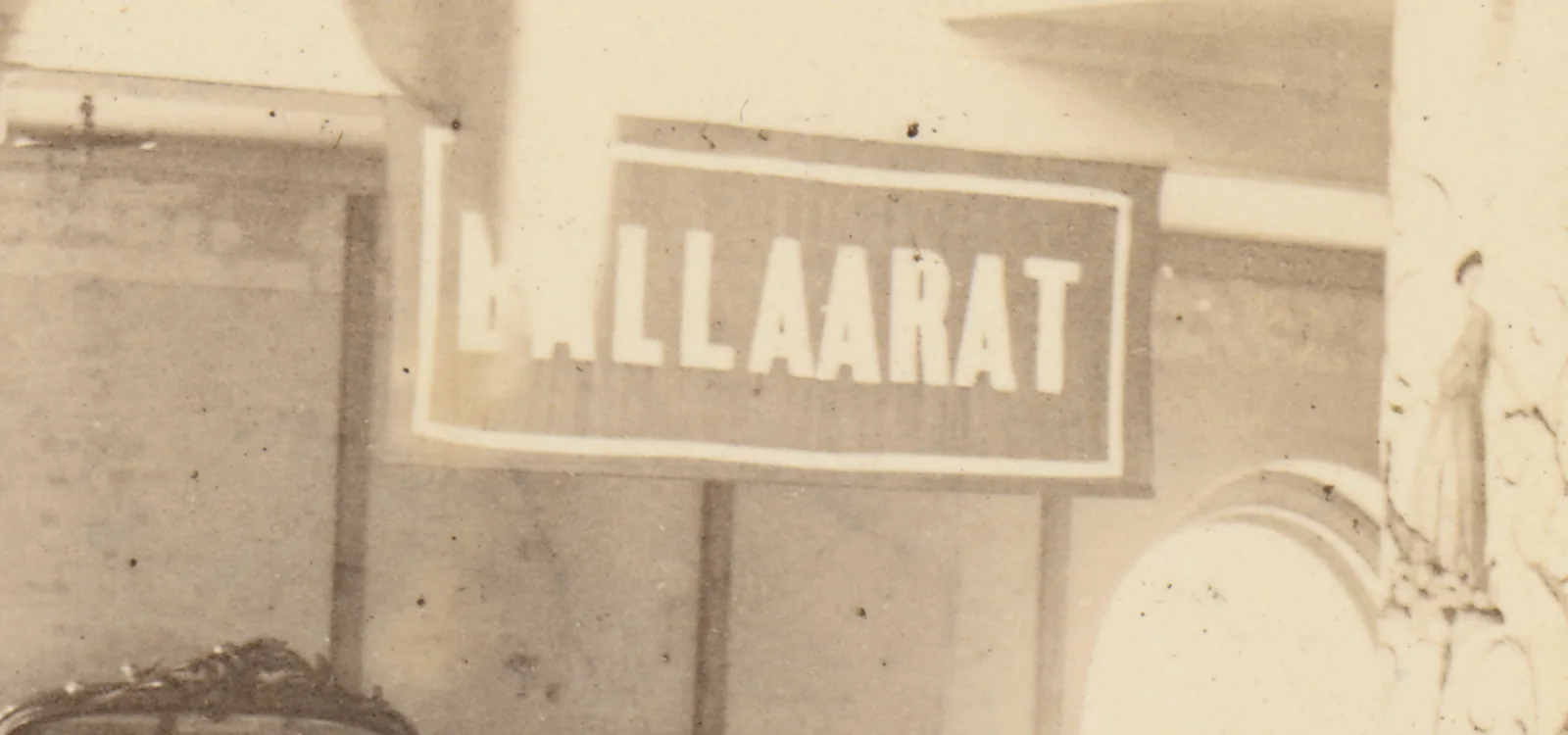 A painted sign reading BALLAARAT over exhibition cases